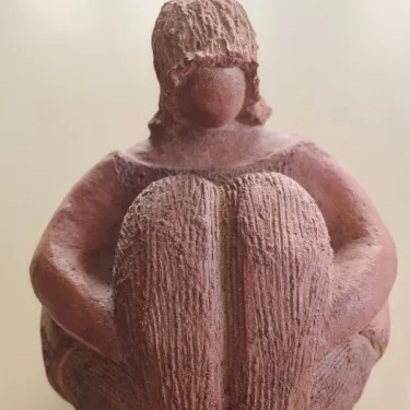 Patinated terracotta sculpture by Marie-Noëlle Ronayette-Grange. Entitled “COCOONING MARRON.”