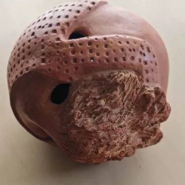 Patinated terracotta sculpture by Marie-Noëlle Ronayette-Grange. Entitled “COCOONING ORANGE.”